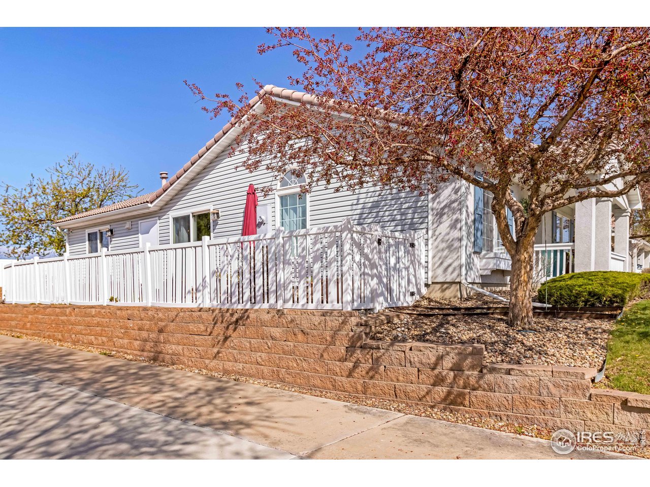 11737 Zenobia Loop Westminster, CO 80031 - Photo 26 of 39 a view of a house with a yard