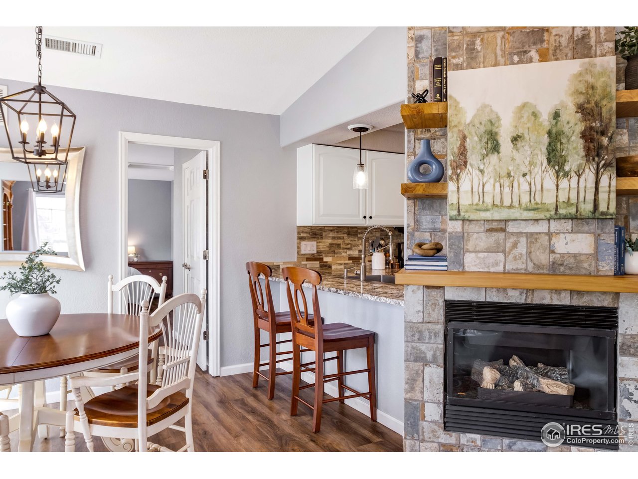 11737 Zenobia Loop Westminster, CO 80031 - Photo 10 of 39 a kitchen with a table and chairs