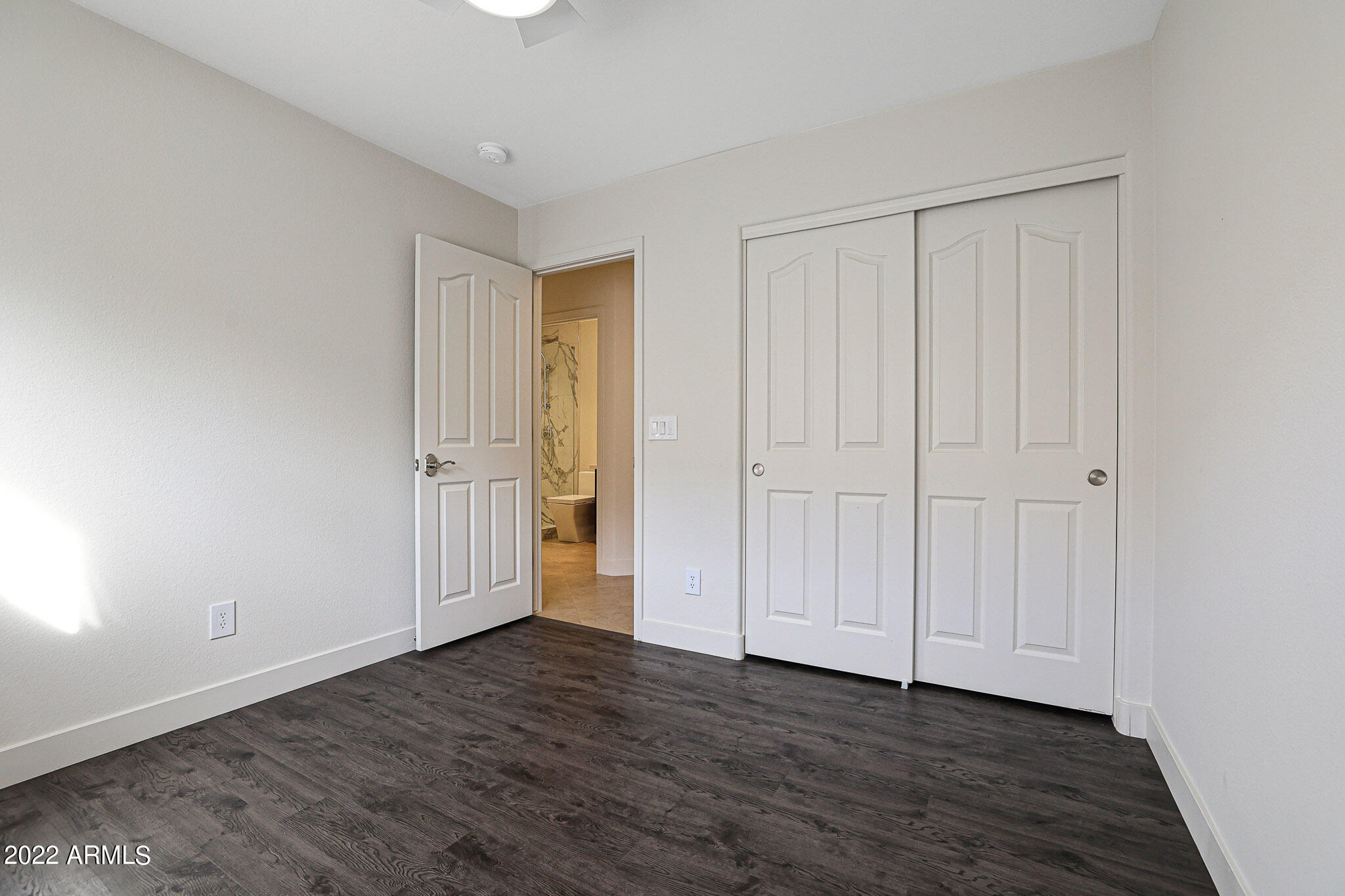 4316 East Rowel Road Phoenix, AZ 85050 - Photo 24 of 40 a view of a livingroom with wooden floor