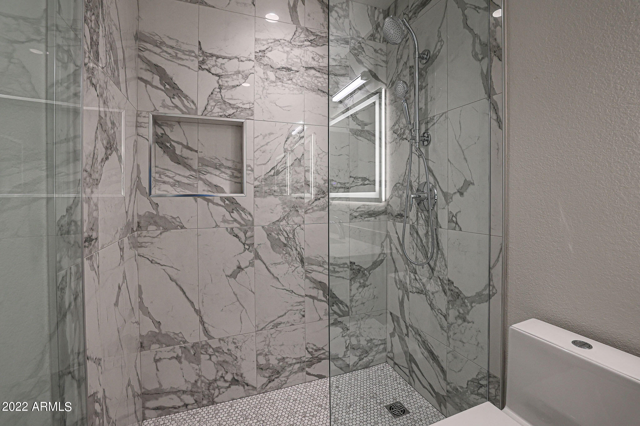 4316 East Rowel Road Phoenix, AZ 85050 - Photo 26 of 40 a bathroom with a shower and toilet