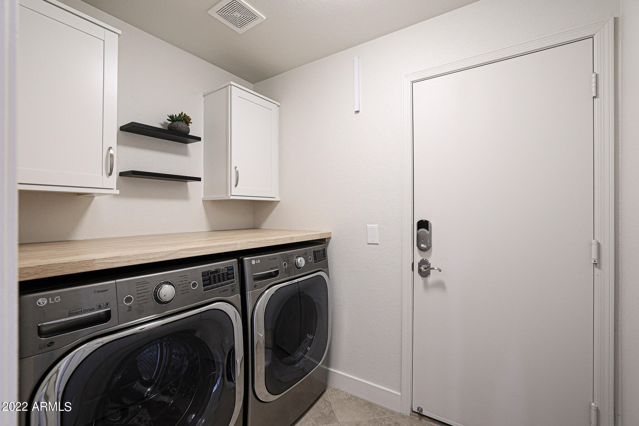 4316 East Rowel Road Phoenix, AZ 85050 - Photo 30 of 40 a utility room with dryer and washer