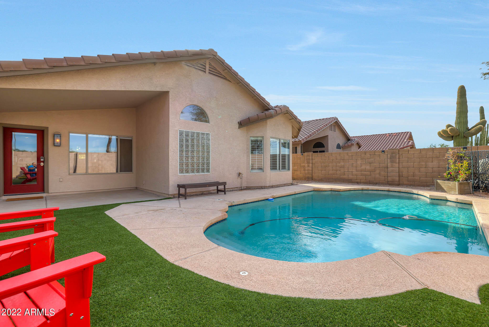 4316 East Rowel Road Phoenix, AZ 85050 - Photo 32 of 40 a view of a house with backyard porch and sitting area