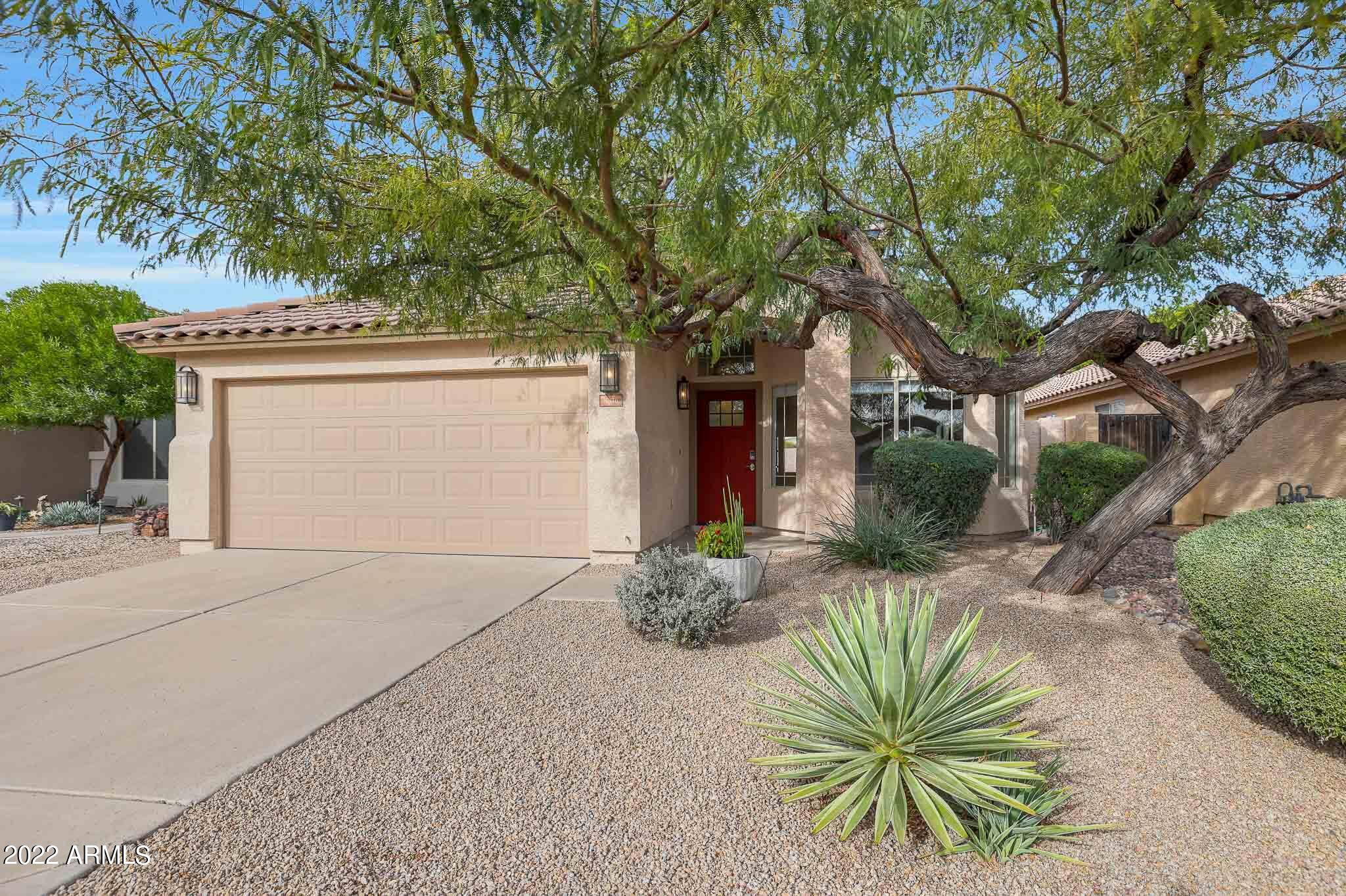 4316 East Rowel Road Phoenix, AZ 85050 - Photo 40 of 40 a front view of a house with a tree