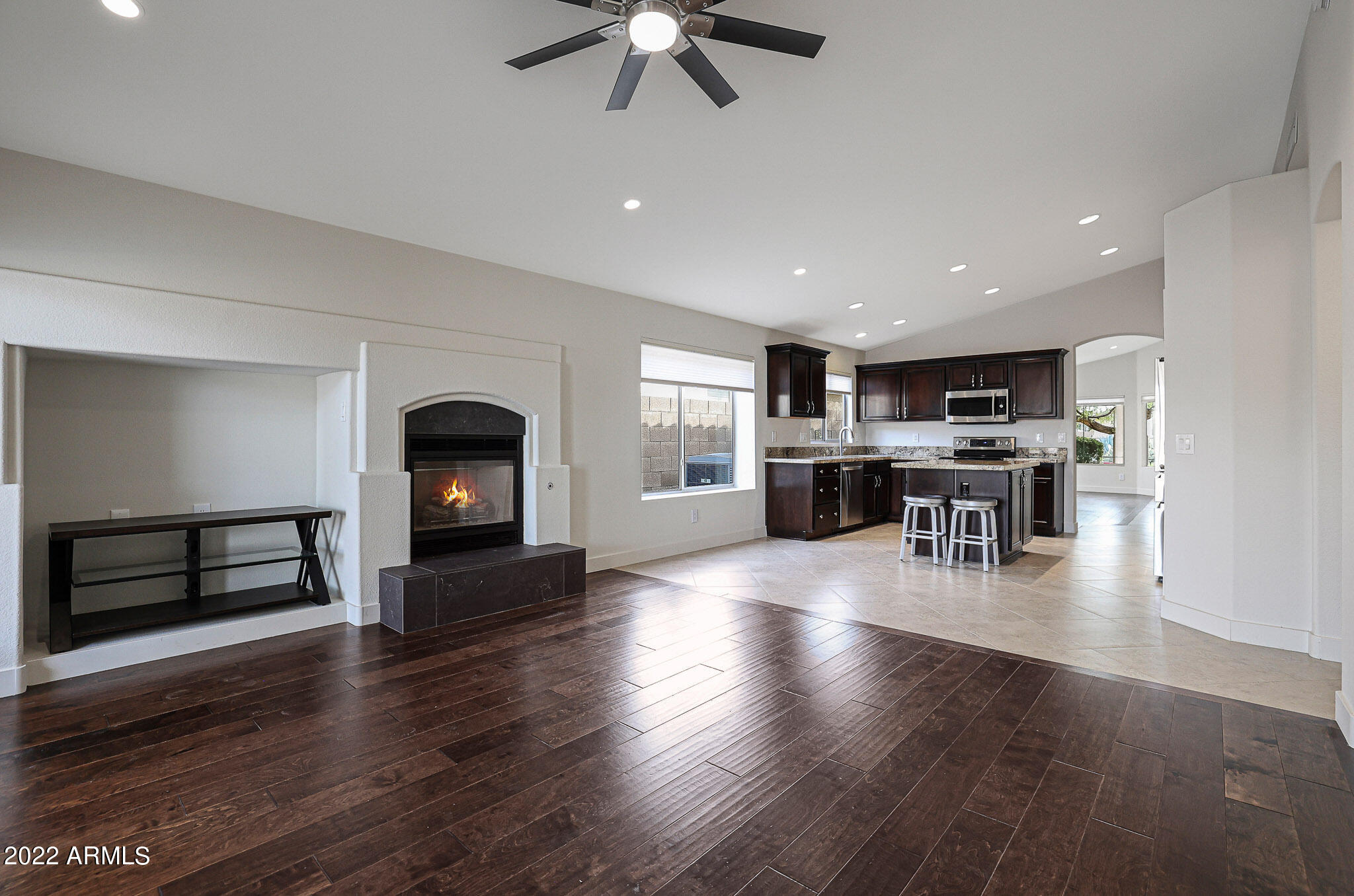4316 East Rowel Road Phoenix, AZ 85050 - Photo 7 of 40 a view of a livingroom with furniture and a fireplace