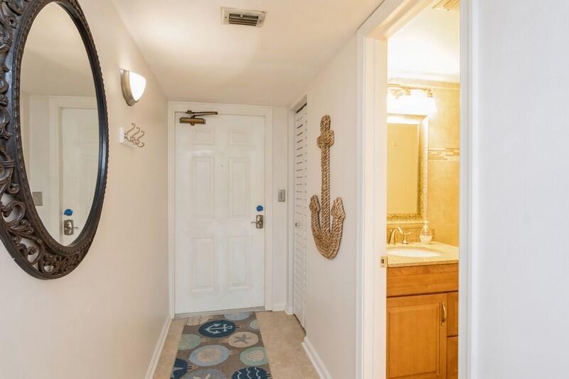 1605 Highway 1, Unit M1202 Jupiter, FL 33477 - Photo 2 of 52 02_1605USHIGHWAY1_UNITM1202_32_Foyer_Fle