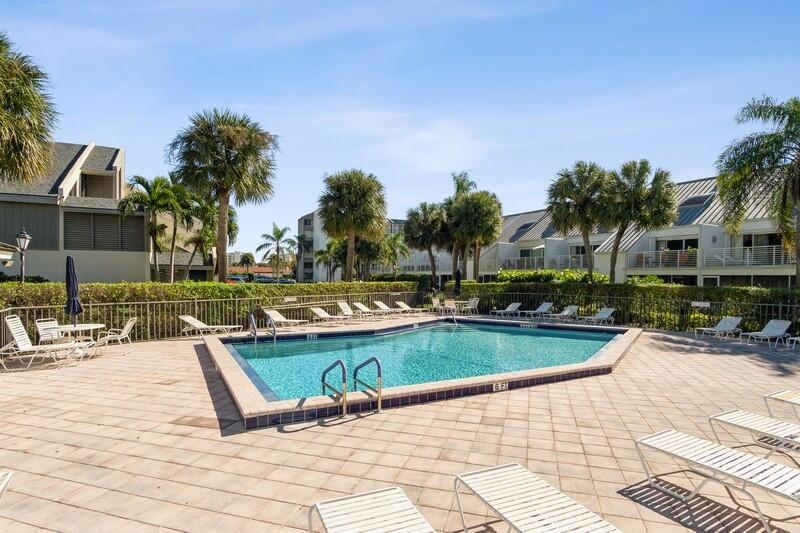 1605 Highway 1, Unit M1202 Jupiter, FL 33477 - Photo 25 of 52 25_1605USHIGHWAY1_UNITM1202_337_Pool_Fle