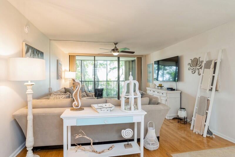 1605 Highway 1, Unit M1202 Jupiter, FL 33477 - Photo 4 of 52 04_1605USHIGHWAY1_UNITM1202_165_LivingRo