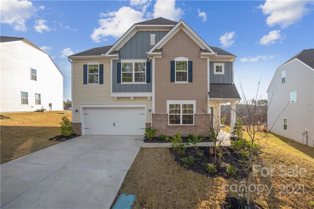 18121 Kalabash Road, Unit 195 Charlotte, NC 28278 - Photo 1 of 39 a view of a front of house with a yard