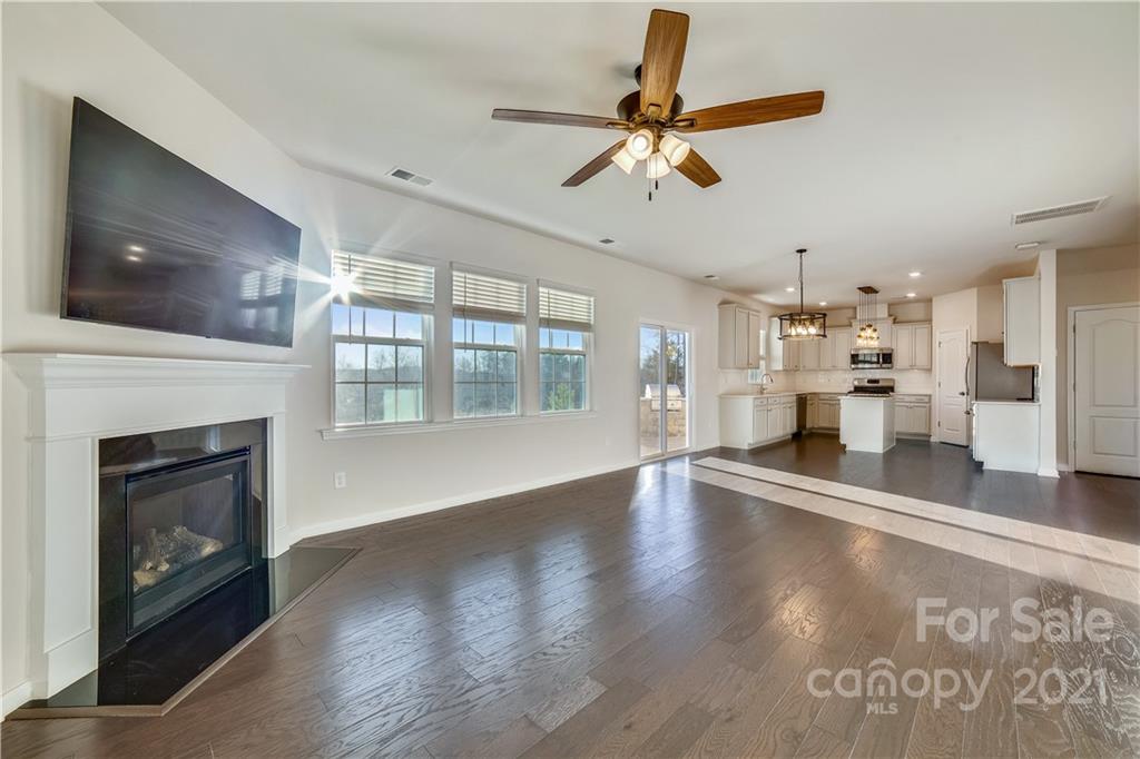 18121 Kalabash Road, Unit 195 Charlotte, NC 28278 - Photo 11 of 39 a view of a living room a window and a fireplace