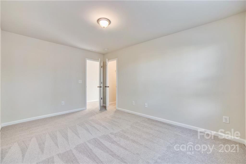 18121 Kalabash Road, Unit 195 Charlotte, NC 28278 - Photo 22 of 39 a view of an empty room