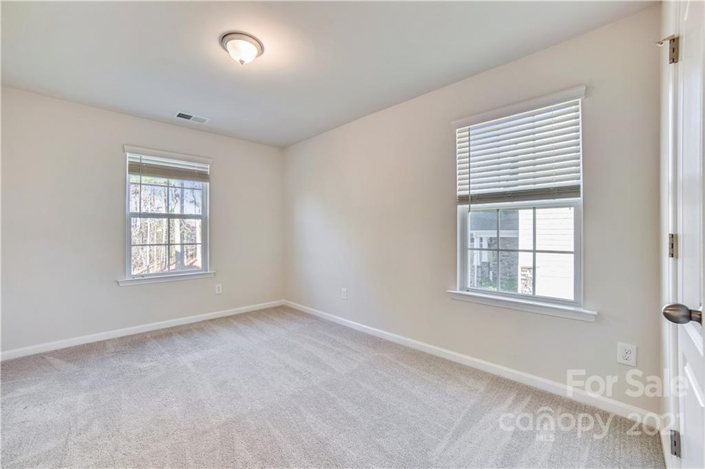 18121 Kalabash Road, Unit 195 Charlotte, NC 28278 - Photo 23 of 39 an empty room with a window