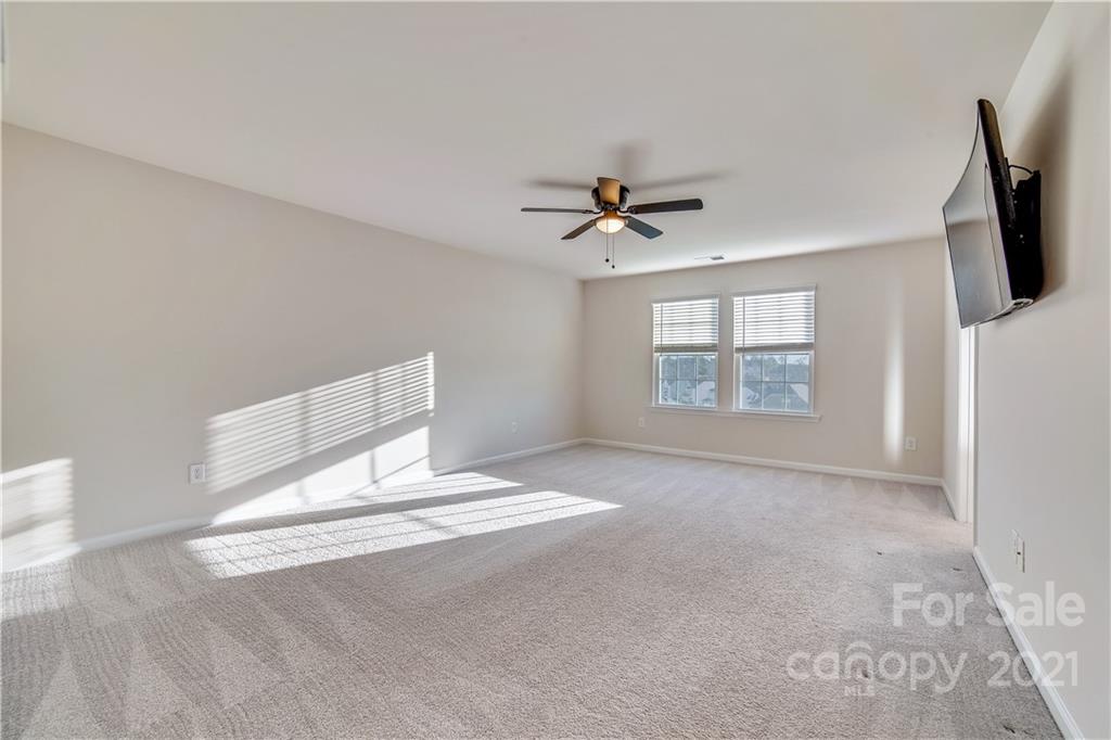 18121 Kalabash Road, Unit 195 Charlotte, NC 28278 - Photo 26 of 39 a view of an empty room with a window