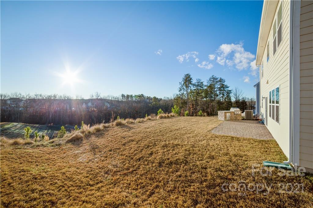 18121 Kalabash Road, Unit 195 Charlotte, NC 28278 - Photo 36 of 39 a view of a yard with an outdoor space