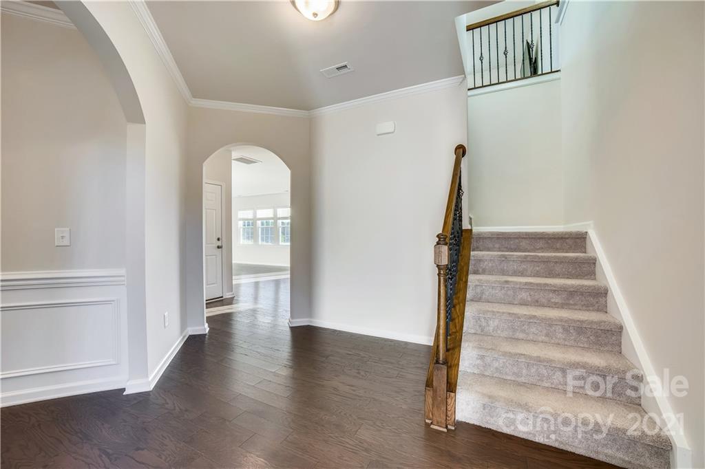 18121 Kalabash Road, Unit 195 Charlotte, NC 28278 - Photo 5 of 39 a view of an entryway with wooden floor