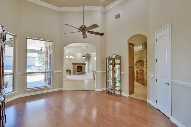 a kitchen with stainless steel appliances granite countertop a sink a oven a stove and a refrigerator