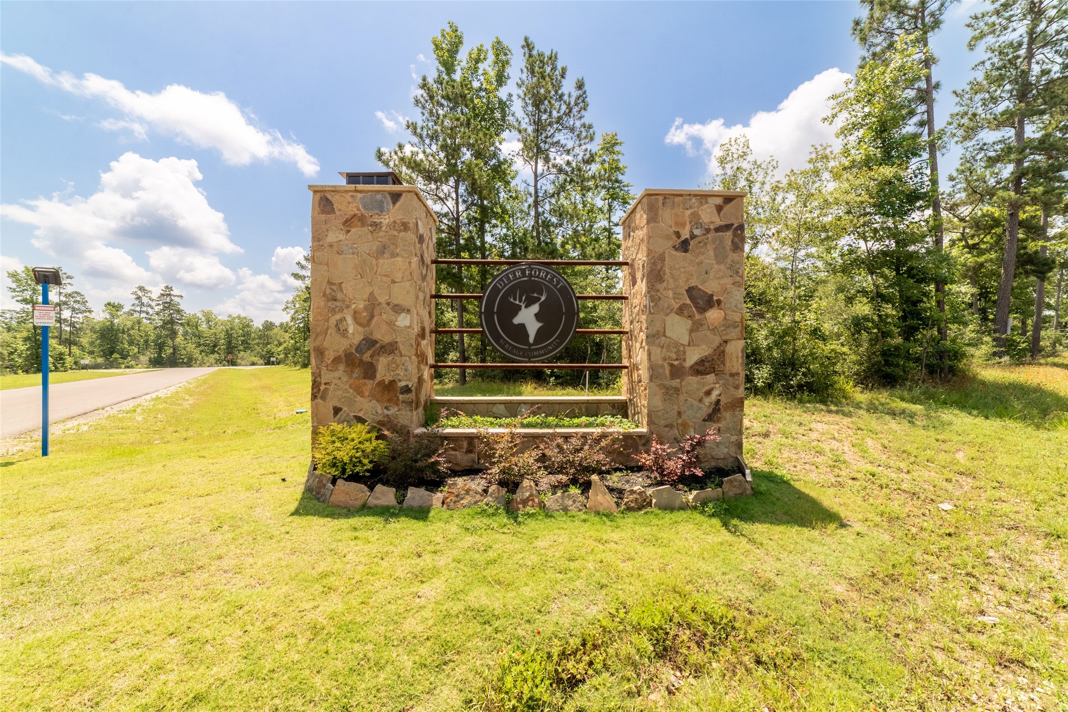 333 Iron Horse Road Willis, TX 77378 - Photo 2 of 15 a front view of a house with a yard
