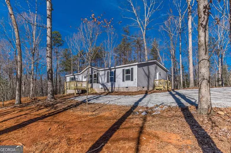 643 Old Ridge Road Demorest, GA 30535 - Photo 11 of 56 a house with trees in the background