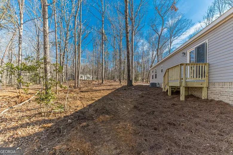 643 Old Ridge Road Demorest, GA 30535 - Photo 16 of 56 a view of a house with backyard and trees