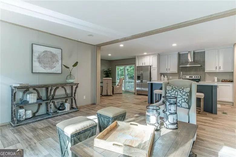 643 Old Ridge Road Demorest, GA 30535 - Photo 23 of 56 a living room with furniture and kitchen view
