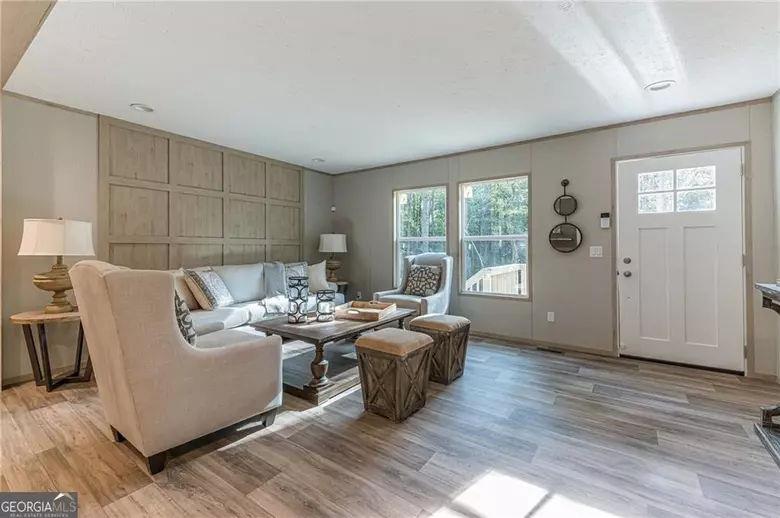 643 Old Ridge Road Demorest, GA 30535 - Photo 25 of 56 a living room with furniture and wooden floor