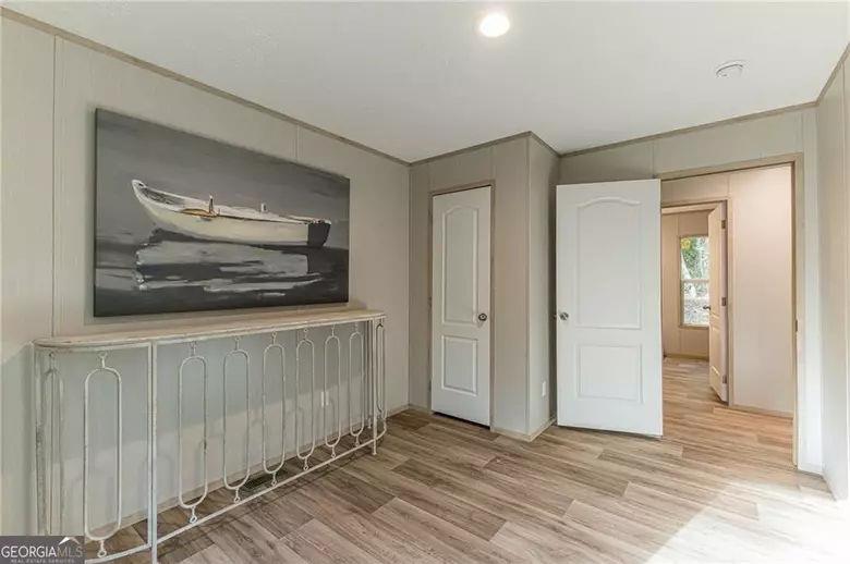 643 Old Ridge Road Demorest, GA 30535 - Photo 40 of 56 a view of a livingroom with wooden floor and cabinet