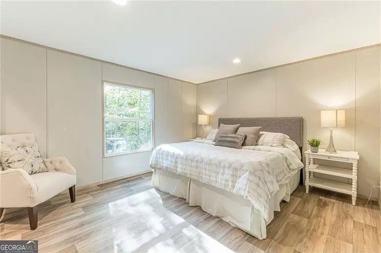 643 Old Ridge Road Demorest, GA 30535 - Photo 44 of 56 a bedroom with a bed and a window