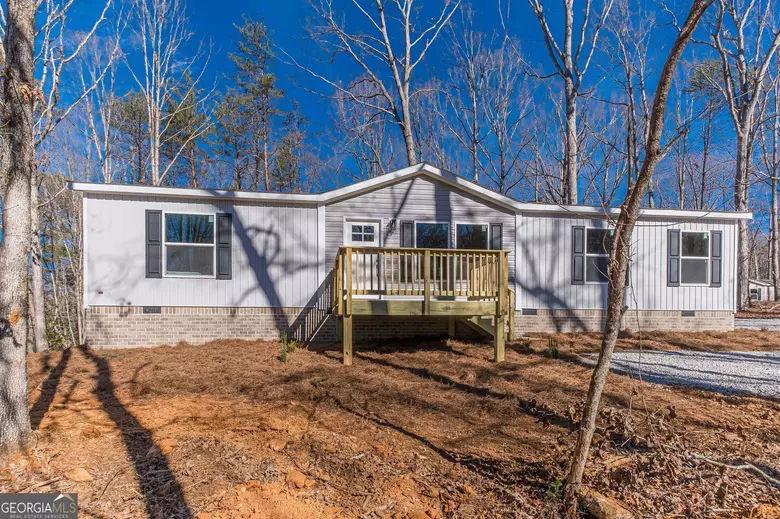 643 Old Ridge Road Demorest, GA 30535 - Photo 7 of 56 a front view of a house with a yard