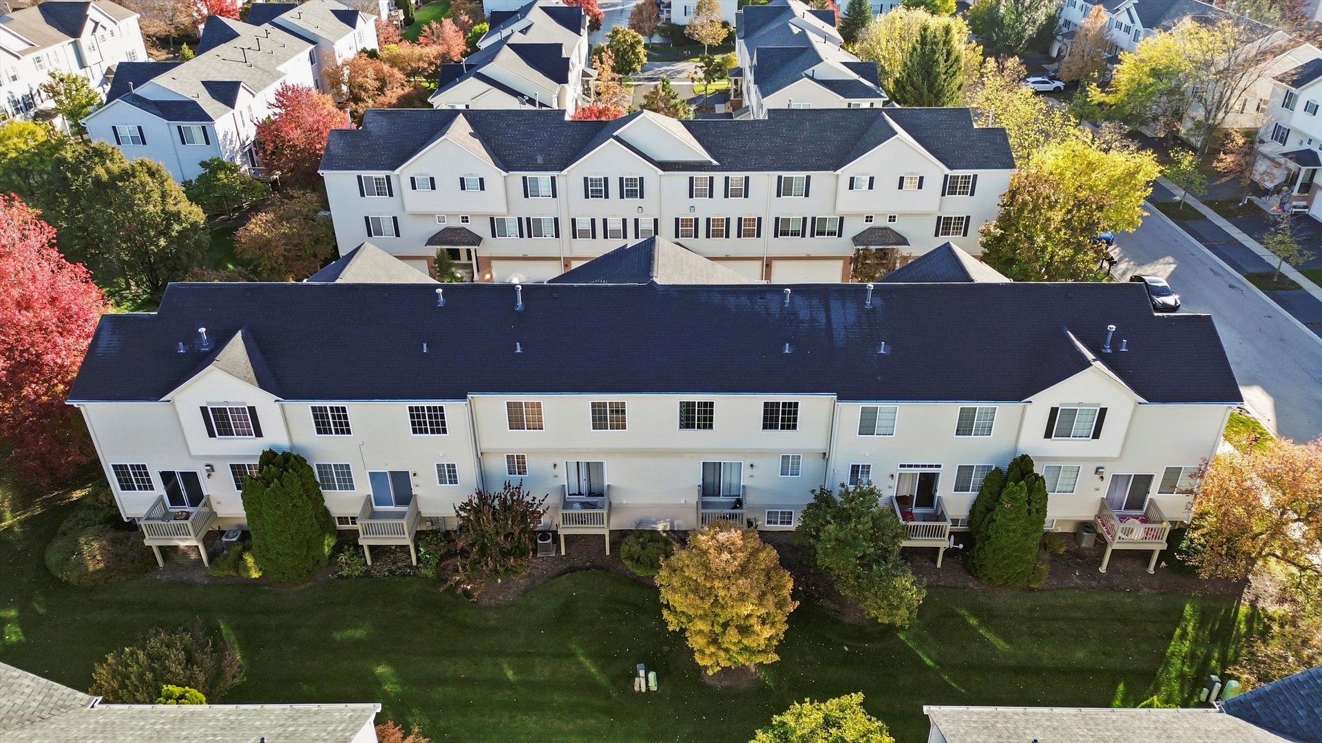 409 Evergreen Circle, Unit 4 Gilberts, IL 60136 - Photo 38 of 42 a view of a house with a yard