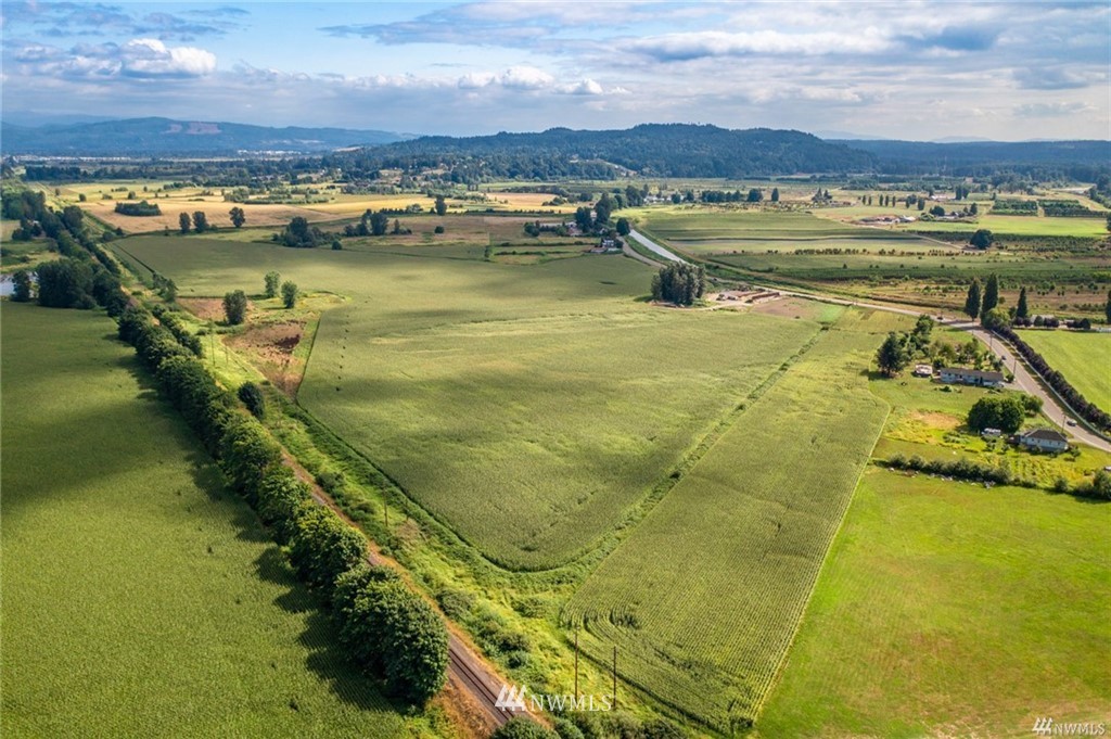 11201 Old Snohomish Monroe Road Snohomish, WA 98290 - Photo 5 of 11 a view of a lake with a mountain