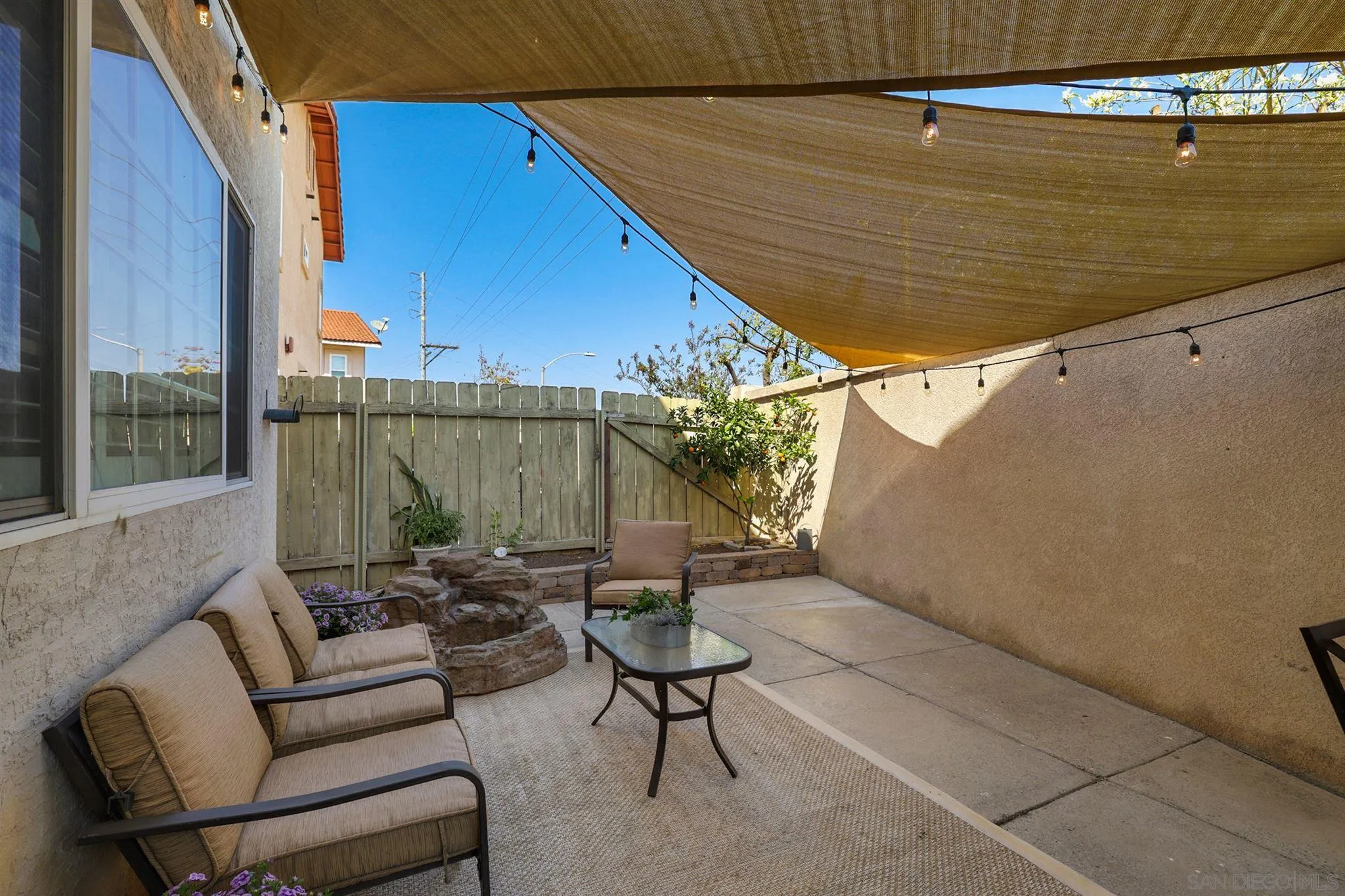7949 Winter View Court El Cajon, CA 92021 - Photo 17 of 27 a backyard of a house with seating space