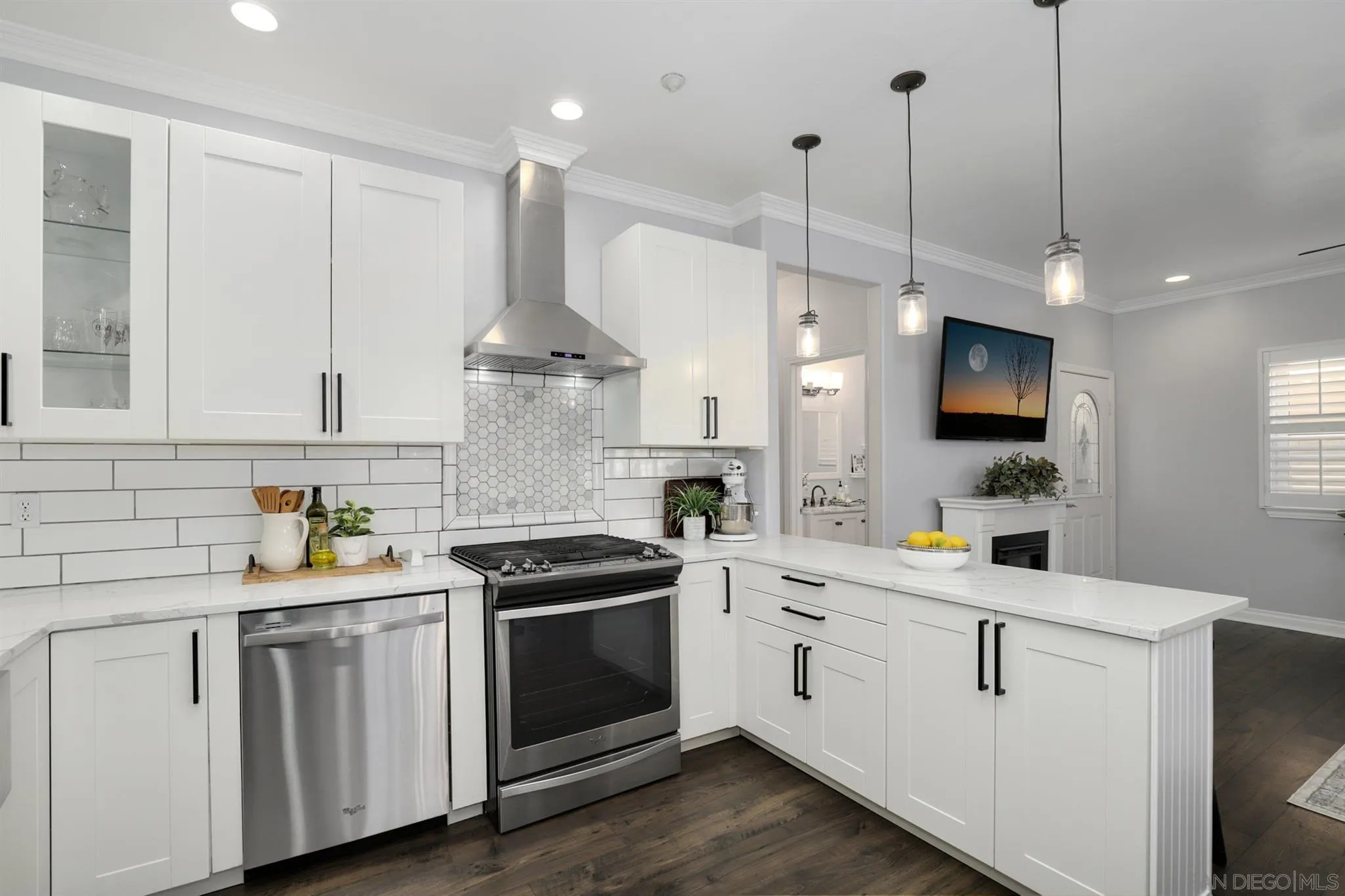 7949 Winter View Court El Cajon, CA 92021 - Photo 2 of 27 a kitchen with white cabinets and white appliances