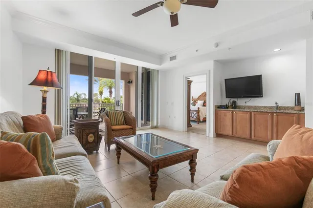 a view of a dining room with furniture and front door