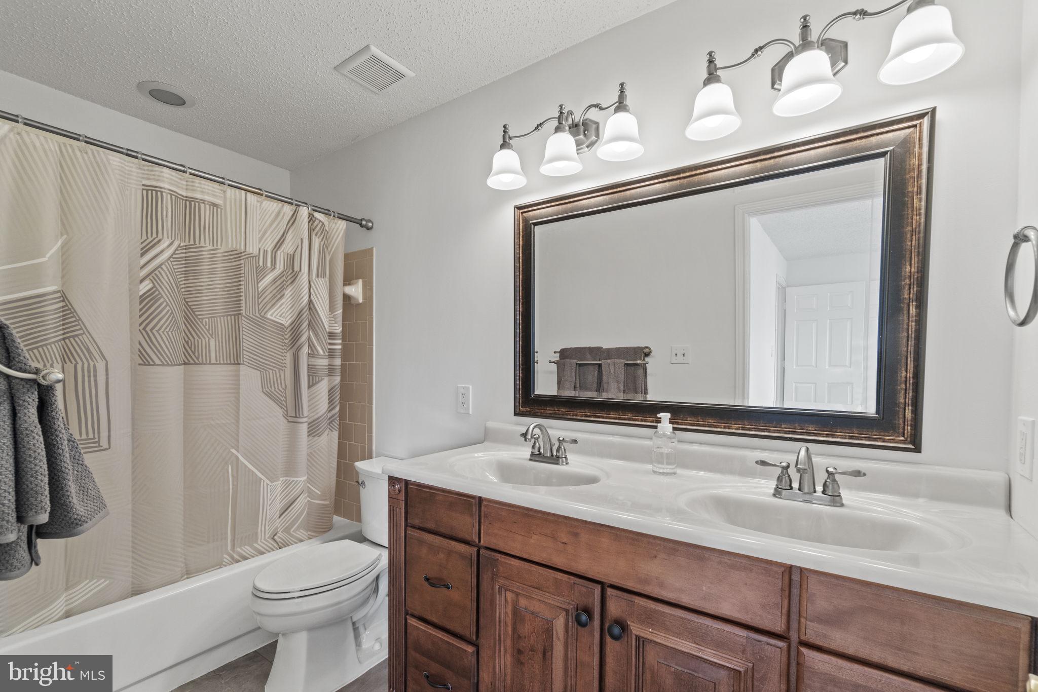 21019 Timber Ridge Terrace, Unit 301 Ashburn, VA 20147 - Photo 13 of 20 Primary Bathroom