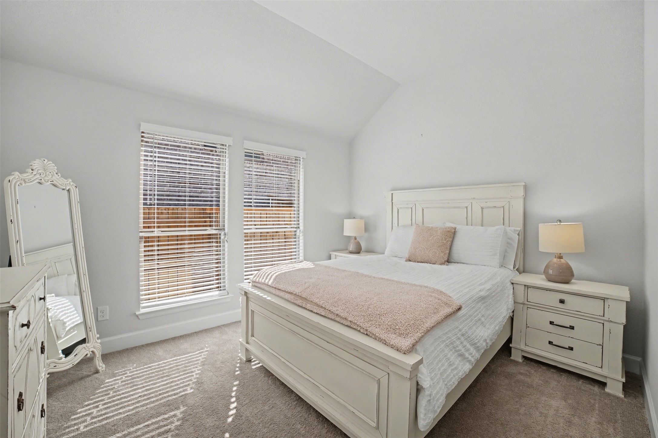186 Prickly Poppy Loop Kyle, TX 78640 - Photo 23 of 40 a bedroom with a large bed and a window