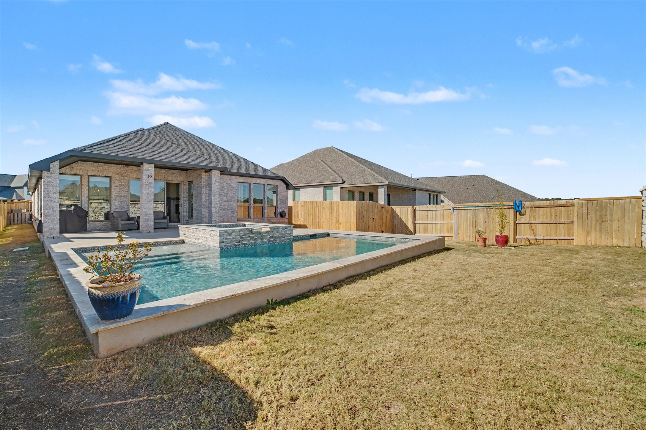186 Prickly Poppy Loop Kyle, TX 78640 - Photo 35 of 40 a view of a house with a yard balcony and sitting area