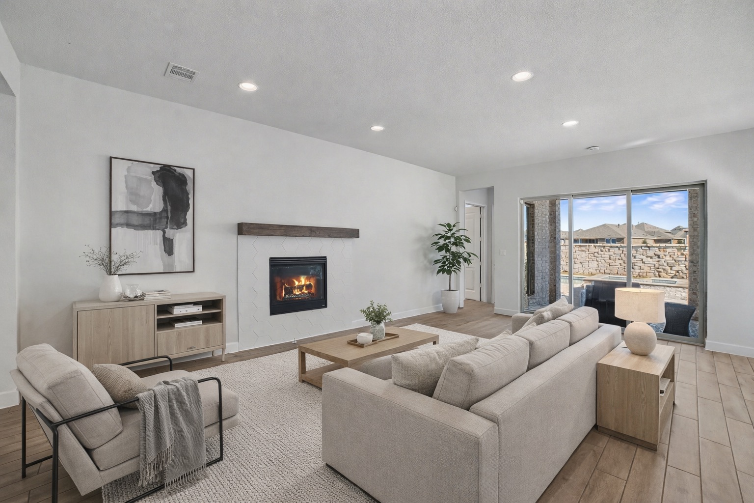 186 Prickly Poppy Loop Kyle, TX 78640 - Photo 4 of 40 a living room with furniture fireplace and a large window