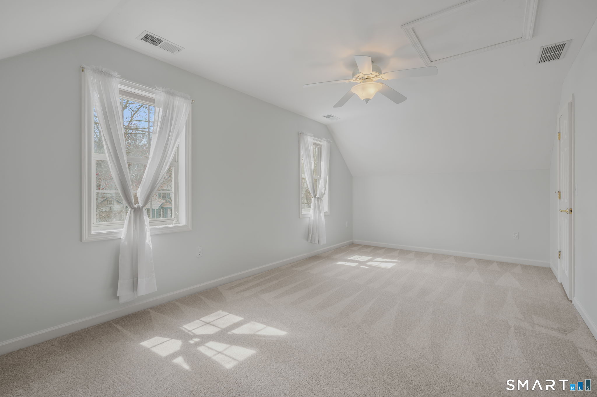 1 Bittersweet Lane, Unit 1 East Lyme, CT 06357 - Photo 22 of 26 a view of an empty room with a window
