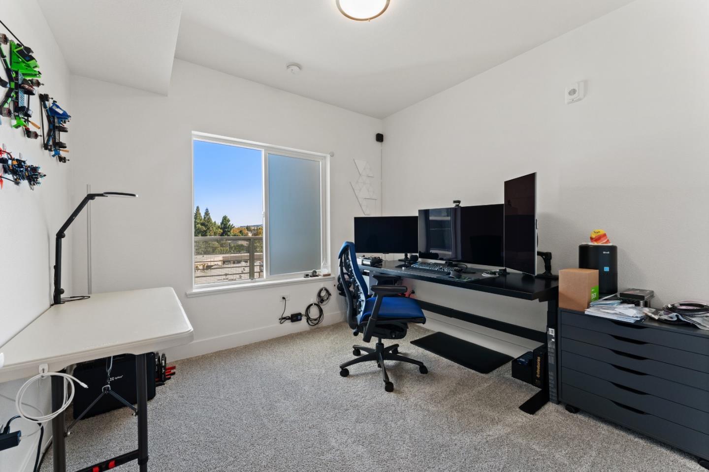 1853 Almaden Road, Unit 504 San Jose, CA 95125 - Photo 14 of 18 a view of a livingroom with workspace and a window