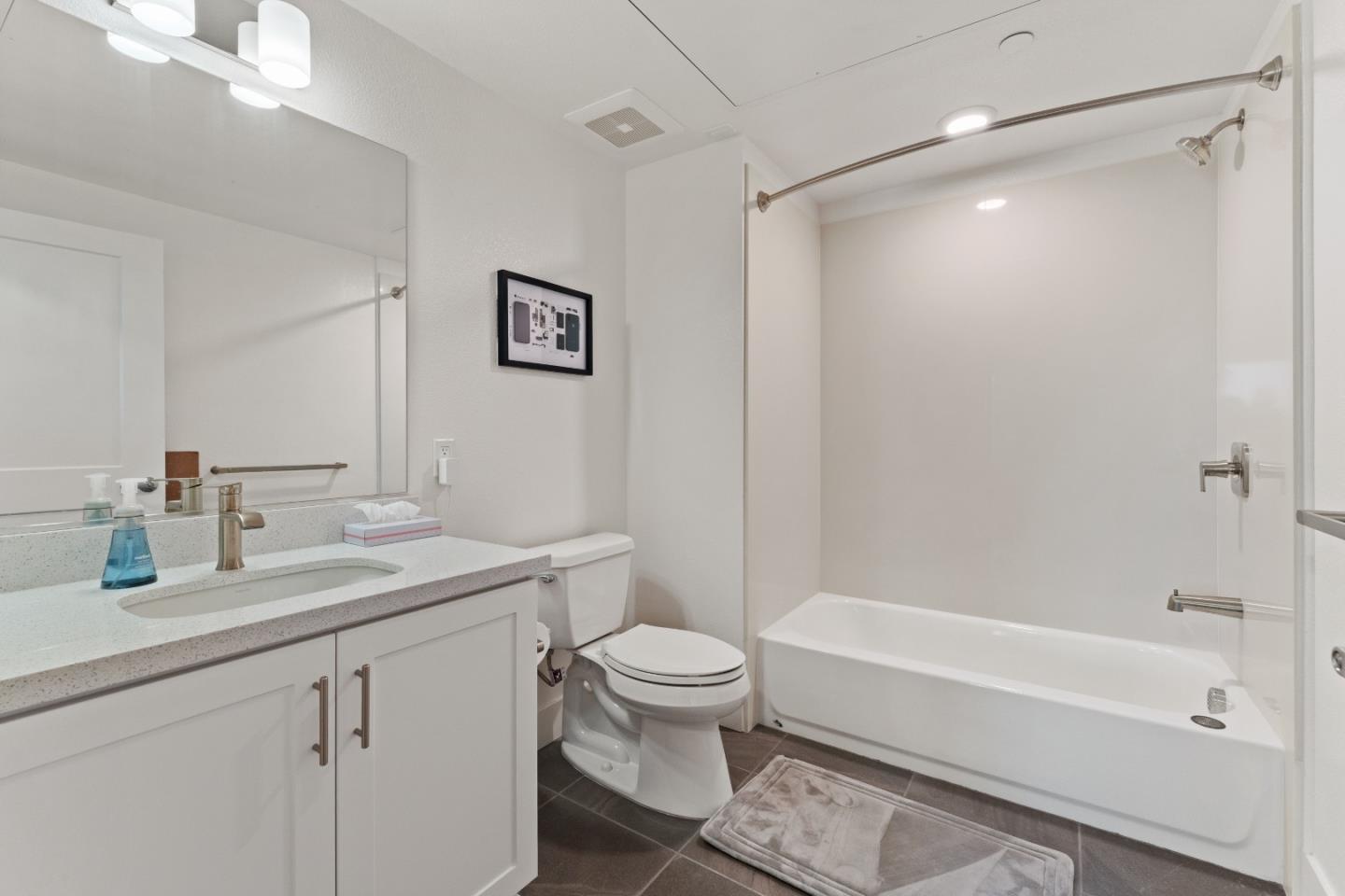 1853 Almaden Road, Unit 504 San Jose, CA 95125 - Photo 15 of 18 a bathroom with a sink a toilet and a bathtub