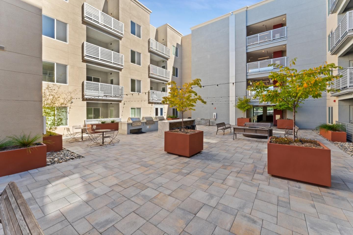 1853 Almaden Road, Unit 504 San Jose, CA 95125 - Photo 17 of 18 a view of a building with outdoor seating