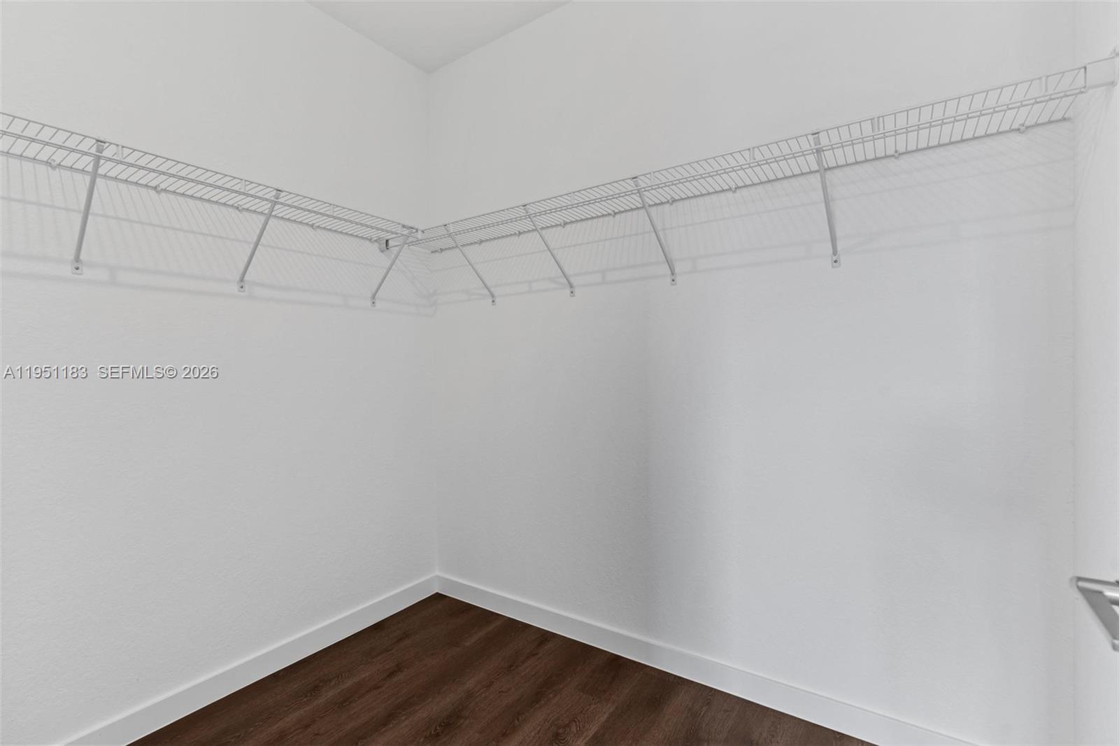 13361 Southwest 272nd Lane Homestead, FL 33032 - Photo 21 of 27 a view of a room with racks on the wall