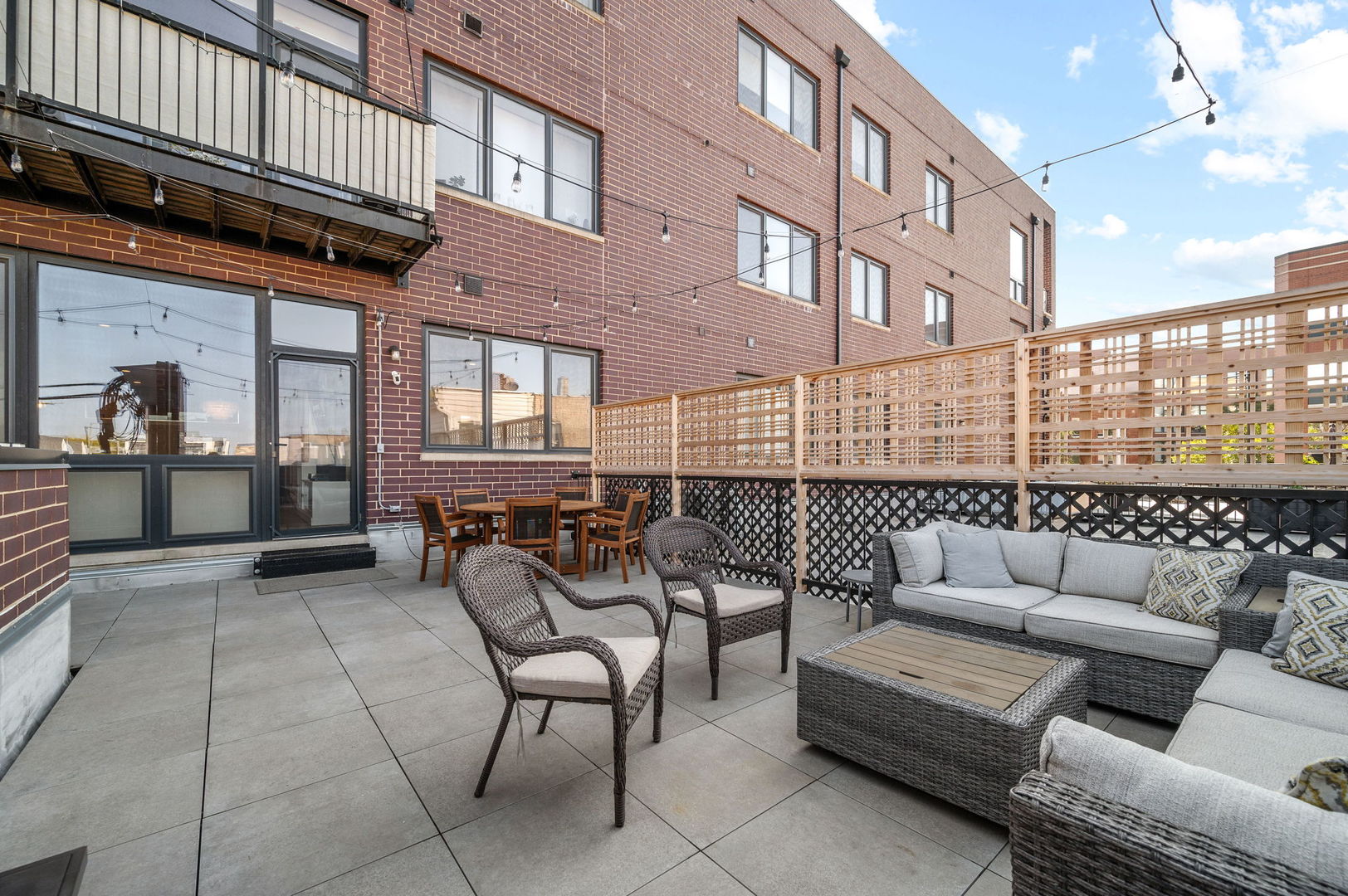 3101 North Ridgeway Avenue, Unit 2E Chicago, IL 60618 - Photo 14 of 18 a balcony with furniture