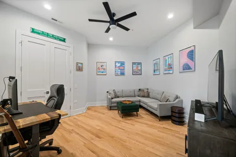 a bedroom with furniture and a window