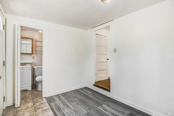 a view of balcony with wooden floor