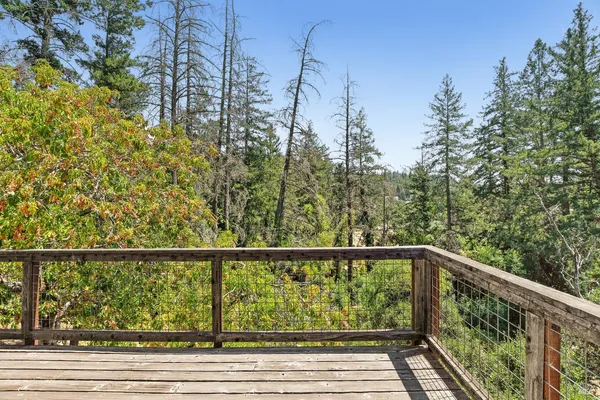 a view of balcony with trees