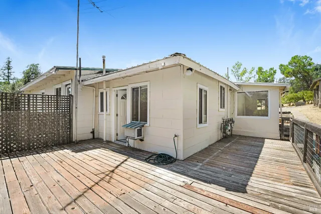 a view of room with window and hardwood