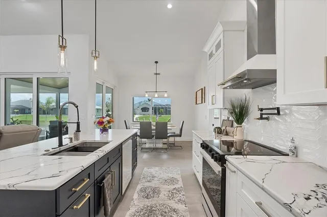 a bedroom with a large bed and a large window