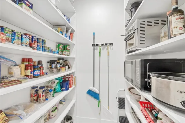 a spacious bathroom with a double vanity sink mirror and double