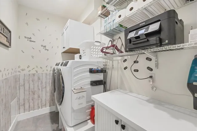 a view of a patio with swimming pool