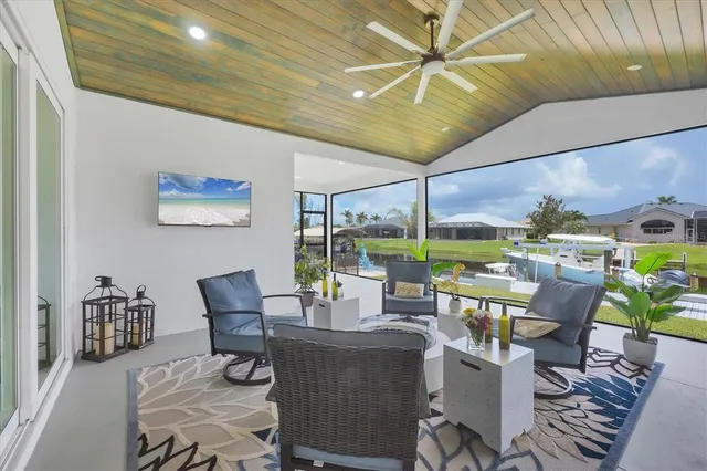 a view of a lake with houses in the background